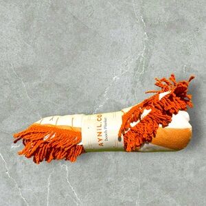 Brand new beach blanket orange cream color